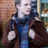 The Portable Door Patrick Gibson Brown Coat