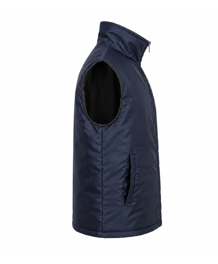 Mountainhead 2025 Jason Schwartzman blue vest with a stylish casual design