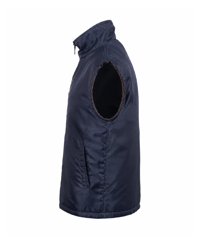 Jason Schwartzman Mountainhead 2025 blue vest featuring a modern layered look