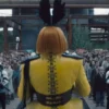 Glenn Close The Hunger Games Sunrise on the Reaping 2026 Drusilla Sickle Yellow Leather Costume Coat with Lace Up Back