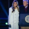 First lady Melania Trump Christmas Tree Lighting Ceremony White Trench Coat