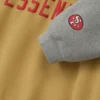 San Francisco 49ers Fear of God Essentials Gold and Gray Hoodie