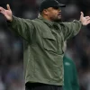Real Madrid v Bayern Munich Vincent Kompany Y-3 Field Green Hooded Jacket Right pose