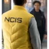 Todd Lasance NCIS Sydney Yellow Vest Back