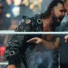 WWE 2026 WrestleMania 42 Seth Rollins Black Leather Hooded Long Coat with Grommets