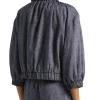 The View 2026 Joy Behar Grey Ruffle Neck Jacket Back