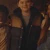 Graham Harvey Matchbox the Movie 2026 Brown & Blue Puffer Vest