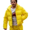 Jonathan Bailey Paris Fashion Week Yellow Puffer Jacket Front