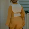 Office Romance 2026 Jennifer Lopez Yellow Vest Back