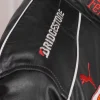 Men's black F1 racing jacket with two side pockets and sporty details