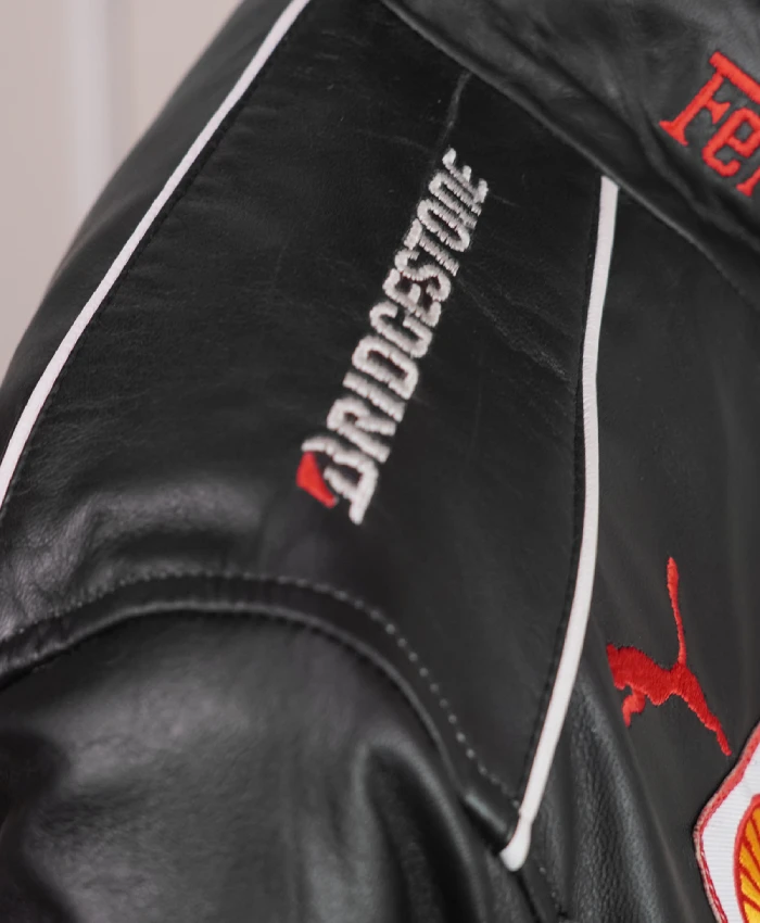 Men's black F1 racing jacket with two side pockets and sporty details