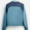 Bryn Chapman Parish TV Series Heartbreak High 2026 Spider Blue Cotton Jacket Back View