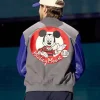 Disney-Entertainment-Showcase-2026-Mickey-Mouse-Ryan-Gosling-Grey-and-Blue-Varsity-Jacket