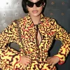 Kehlani Concert 2026 Cardi B Chanel Métiers d'Art Collection Yellow Jacket