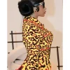 Kehlani Concert 2026 Cardi B Chanel Métiers d'Art Collection Yellow Jacket Side View