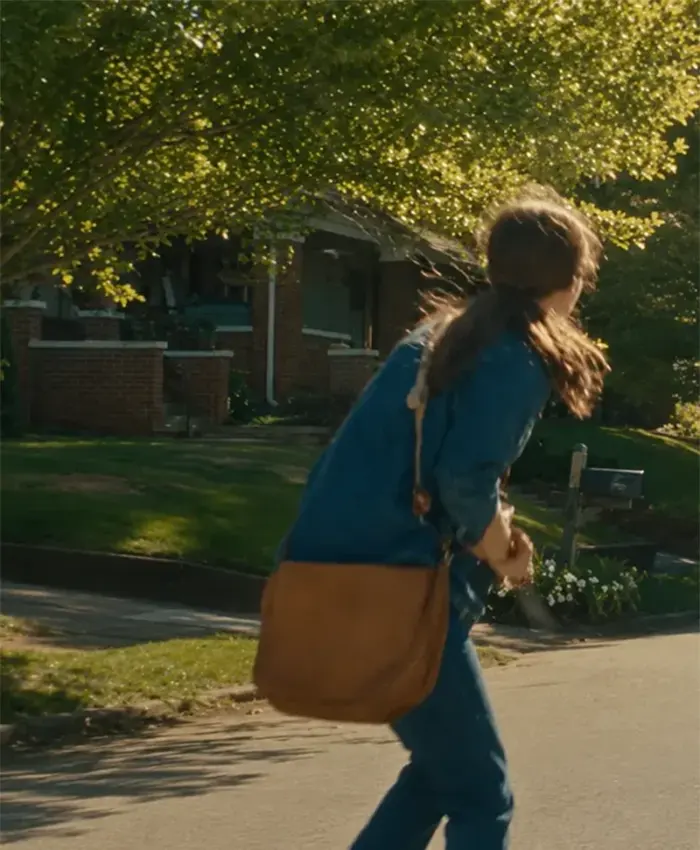 Movie The End of Oak Street 2026 Anne Hathaway Blue Denim Jacket Back View