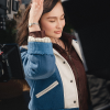 Watch-Campaign-2026-Lola-Tung-Blue-and-White-Coach-Wool-Varsity-Jacket-Front