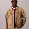 Calvin Klein Fall 2026 “Feel the Fit” Denim Campaign 90s Jungkook Denim Trucker Jacket Front