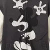 Halloween x The Haunted House x Mickey Mouse Knitted Black and White Varsity Jacket Front
