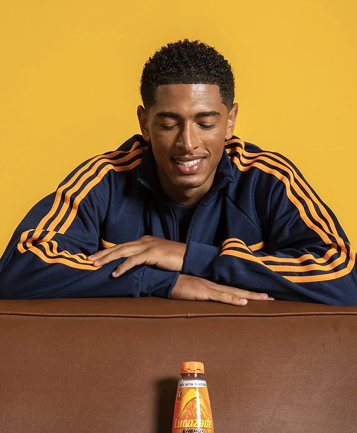 Jude Bellingham Lucozade Campaign Photoshoot 2026 Navy Blue with Yellow Stripes Adidas Jacket Front