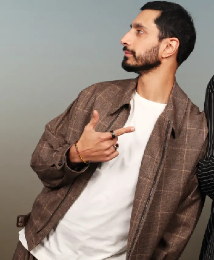Riz Ahmed TV Series Bait 2026 Shah Latif Brown Wool Funnel Check Jacket