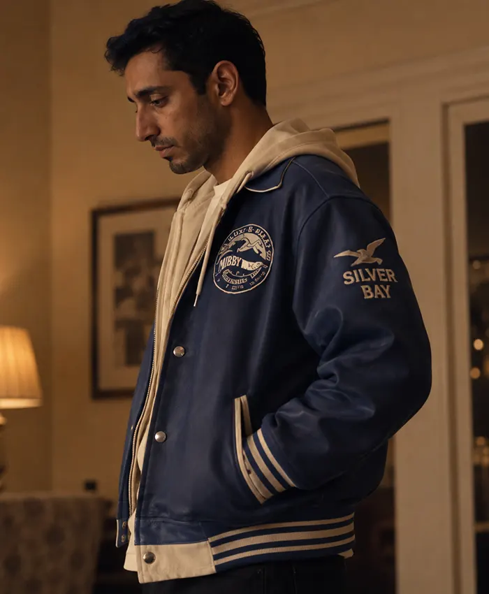 Shah Latif TV Series Bait 2026 Riz Ahmed Blue Leather Varsity Jacket Side View