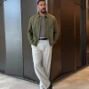 Toronto International Film Festival 2026 Aaron Pierre Olive Green Suede Jacket Front