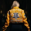 Women’s 48 Anniversary Pelle Pelle American Bruiser Yellow Cropped Leather Bomber Jacket Back View