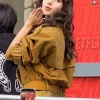 Lisa Greets Fans Outside NRJ Radio studio Mustard Cropped Jacket Back