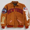 New York Knicks Fanatics 2026 NBA Finals Champions Artisan Brown Bomber Jacket