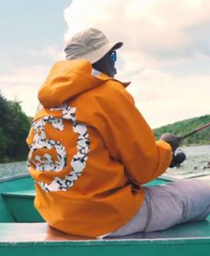 Stüssy x Denim Tears Fall Winter 2026 Collection Orange Hooded Jacket Back